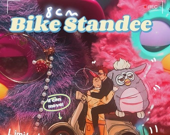 Angel and Demon Adopting a Cursed Giant Furby Acrylic Bike Standee