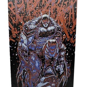 May include: An artistic print of a superhero in a dark, armored suit, rendered in shades of blue, brown, and white against a black background. The background features red lettering. The artwork is mounted on a black easel.