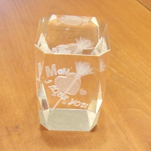 A Heavy Geometric Shaped Clear Glass Paperweight with Mom I Love You Hearts and Flowers