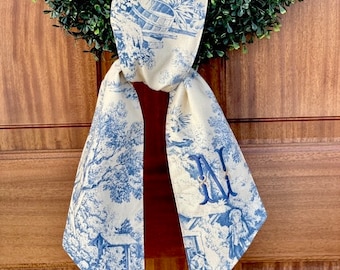 personalized blue toile wreath sash for front door, custom monogram shower gift, blue and white porch bow, chinoiserie wedding swag