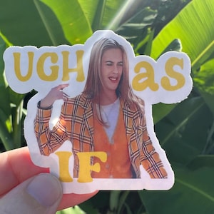 May include: A die-cut sticker featuring a woman in an orange and yellow plaid blazer and the text "UGH as IF" in yellow. The woman is making a dismissive hand gesture.