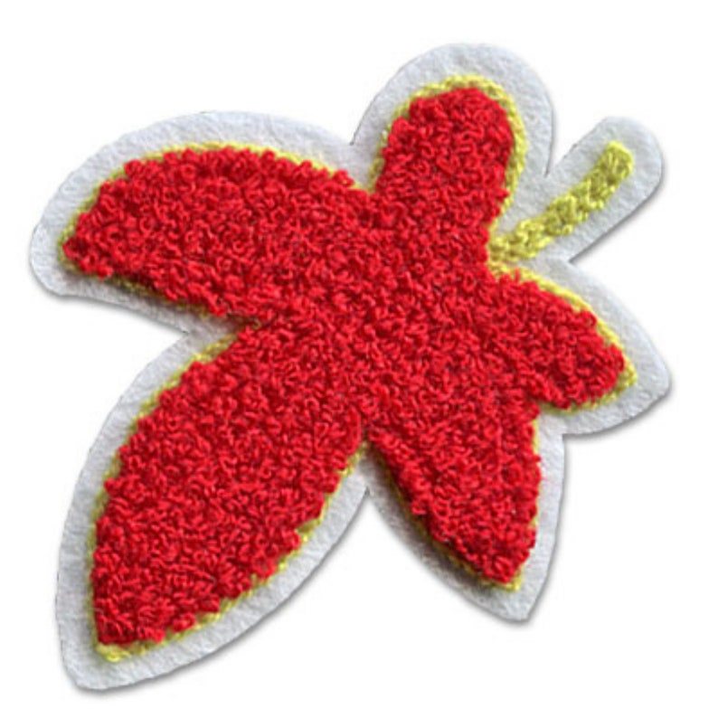 May include: A red, textured leaf-shaped patch with a white border and yellow accents. The patch has a detailed, embroidered appearance, and is likely designed for application on clothing or accessories.