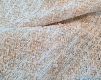Italienskt tweed-bomullstyg i beige och benvitt med tunn guldtråd