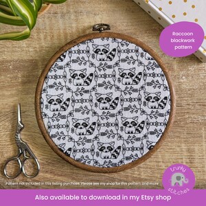 May include: A black and white embroidery hoop with a pattern of raccoons and leaves. The text "Raccoon blackwork pattern" is in a purple circle in the upper right corner. The text "trunky stitches" is in a purple circle with an elephant in the lower right corner. The text "Pattern not included in this listing purchase. Please see my shop for this pattern and more" is at the bottom of the image. The text "Also available to download in my Etsy shop" is at the bottom of the image.