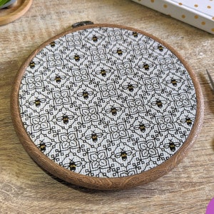 Bee cross stitch Blackwork pattern with repeating flowers | Modern monochrome geometric blackwork embroidery | Gold bumblebee black work