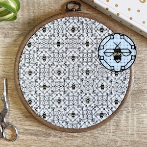 Bee cross stitch Blackwork pattern with repeating flowers | Modern monochrome geometric blackwork embroidery | Gold bumblebee black work
