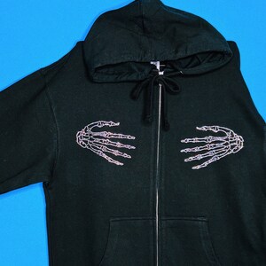Skeleton hands sweatshirt clearance