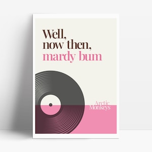 May include: A white poster with a black and gray vinyl record design. The text "Well, now then, mardy bum" is in black text. The text "Arctic Monkeys" is in pink text.
