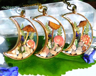 Gold moon mushroom necklace with fern leaves, moss, and pebbles, moon shaped botanical terrarium jewelry, plant lover gift, fairy pendant