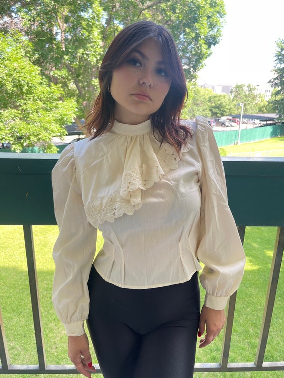 Creme Ruffle Blouse Gem