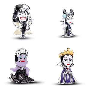 May include: Four silver-toned charm beads featuring iconic villain characters. Includes Cruella De Vil in black and white, Maleficent in black and purple, Ursula in purple and black, and the Evil Queen in purple and gold.