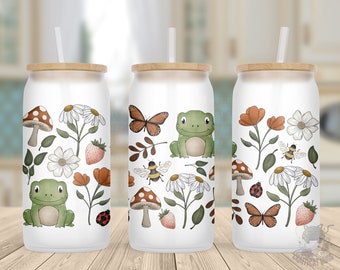 May include: Three white stainless steel tumblers with a bamboo lid and straw. Each tumbler features a different nature-themed design with a green frog, a butterfly, mushrooms, flowers, and ladybugs.