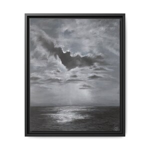 May include: A framed grayscale artwork depicting a seascape under a cloudy sky. The painting features a dark ocean reflecting light, with a dramatic cloud formation and visible brushstrokes. The artwork is encased in a black frame.
