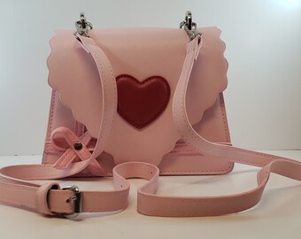 small pink leather purse
