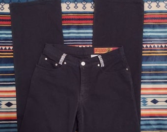 Vaqueros negros para hombres de la ley