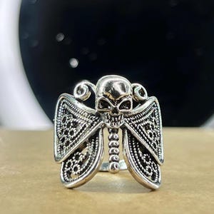 スターリングシルバー バタフライ ウィング リング スカルフェイス付き サイズ 9.75 SKU:22