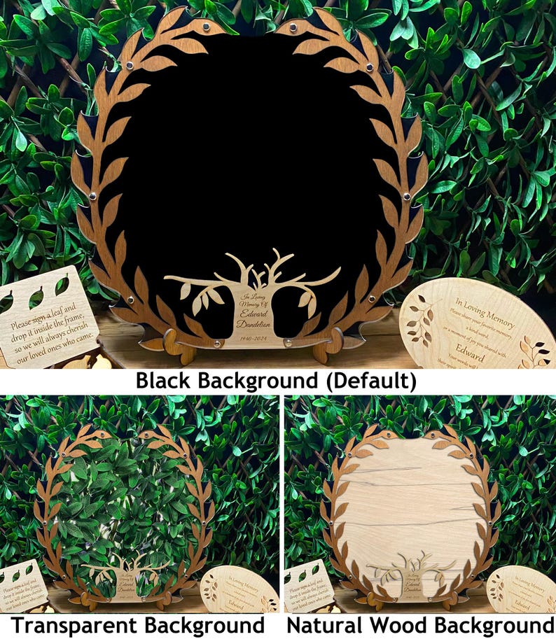 May include: A wooden memorial tree frame with a black background. The frame is decorated with a wreath of leaves and has a cutout of a tree with branches. The text "In Loving Memory of Edward Dandelion 1940-2026" is engraved on the tree. The frame is shown with a small wooden leaf that can be signed and placed inside the frame.