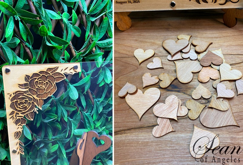 May include: A wooden wedding guest book with a floral design and small wooden hearts. The guest book has a clear acrylic front and a wooden stand. The date "August 14, 2024" is visible on the top.