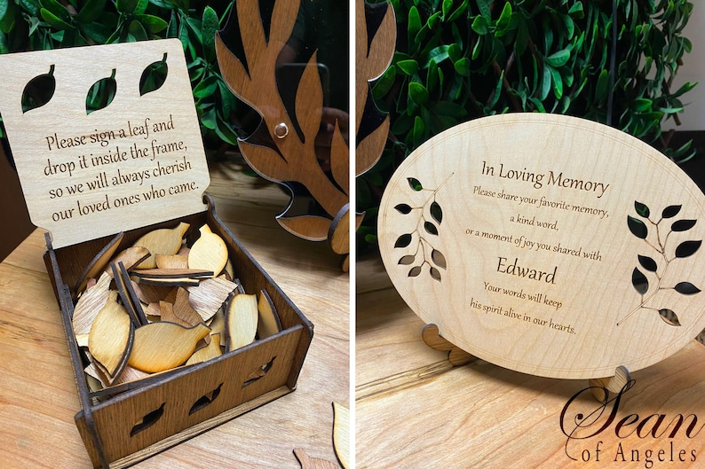 May include: A wooden box with a sign that says "Please sign a leaf and drop it inside the frame, so we will always cherish our loved ones who came." The box is filled with wooden leaves. Next to the box is a wooden plaque with the text "In Loving Memory. Please share your favorite memory, a kind word, or a moment of joy you shared with Edward. Your words will keep his spirit alive in our hearts." The plaque is on a wooden stand.