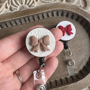 Bow Badge Reel - Etsy