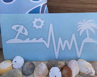 Beach themed auto decal.