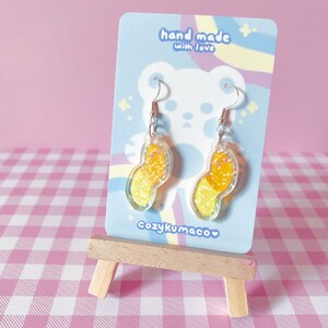 Kawaii Holographic Gummy Worm Earrings In Yellow and Orange