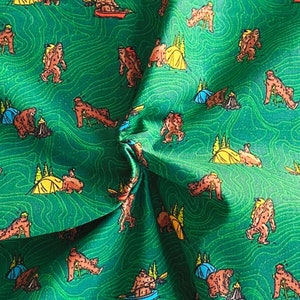 Sasquatch and Big Foot Adventures on Green 44" Wide 100% Cotton Novelty Quilting Fabric