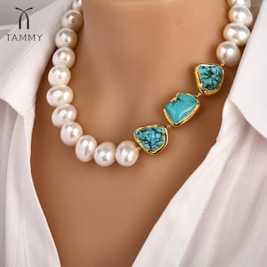 May include: A white pearl necklace with three turquoise stones set in gold. The stones are irregular in shape and have a mottled pattern.