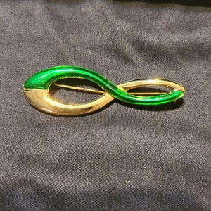 Beautiful gold and green enamel pin