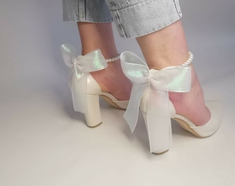 white leather pram with crystals