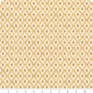May include: A patterned fabric featuring a repeating geometric design in gold and cream. The pattern consists of diamond shapes with a central motif, creating a textured effect. The design is evenly spaced across the material.