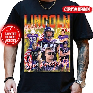 May include: Black t-shirt featuring a custom design with the name "Lincoln Baldwin" in orange and yellow lettering. The shirt displays images of football players in purple uniforms, with the text "Go Knights" in a script font.