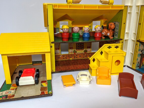 red toy car with yellow roof