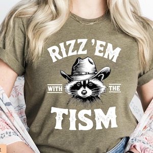 Funny Cowboy Raccoon Shirt, Rizz Em With The Tism, Retro Western Humor Shirt, Gift for Animal Lovers, Autism Awareness Raccoon Meme Shirt