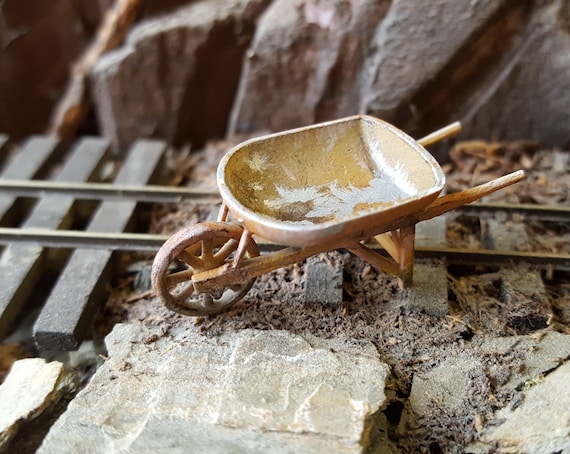 Resin wheelbarrow sale