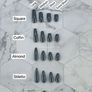 May include: Image showcasing various nail shapes and lengths, including square, coffin, almond, stiletto, and round. Each shape is displayed in long, medium, short, and extra short lengths. The nails are a solid dark gray color, arranged on a white and gray hexagonal tile background. Text reads "Shapes and Lengths".