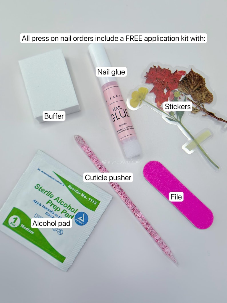 May include: An application kit for press-on nails, including a white buffer, nail glue, stickers, a cuticle pusher, a pink file, and an alcohol prep pad. The kit is designed to help with the application of press-on nails.