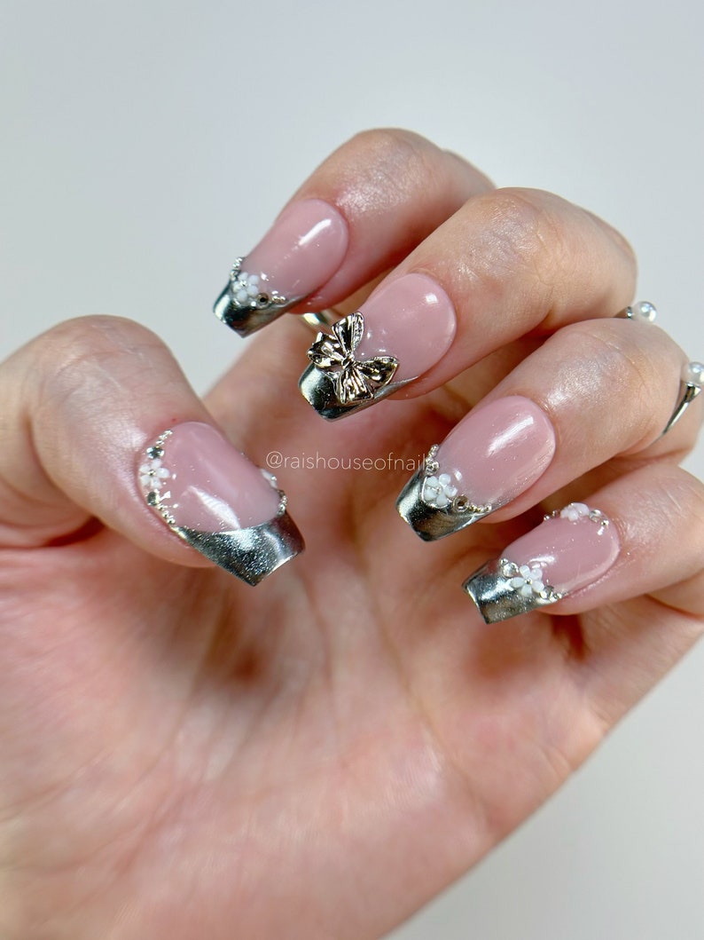 Chrome French tip press on nails with flowers and bow