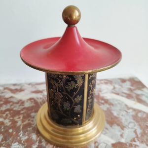Vintage cigarette dispenser in the shape of a pagoda with Japanese-inspired decoration in lacquer and brass