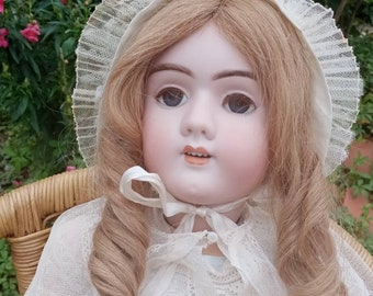 Antique Handwerck porcelain doll with period clothes