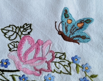 Vintage French hand embroidered placemat with flower and butterfly patterns