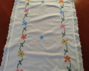 Vintage hand-embroidered cotton table runner edged with English lace