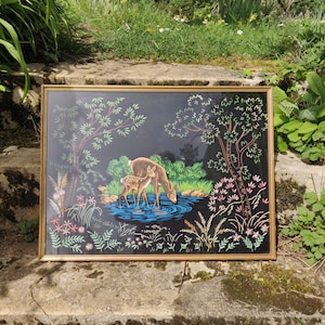 Old embroidery framed under glass Doe and her fawn on black satin