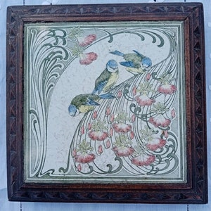Vintage French art nouveau earthenware trivet decorated with birds