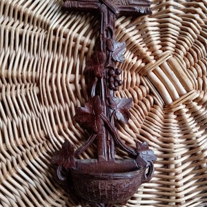 Crucifix and holy water font in carved wood from the Black Forest