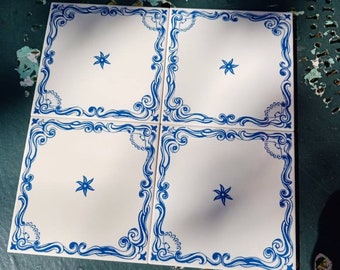 Set van 4 vintage blauw-witte keramische tegels