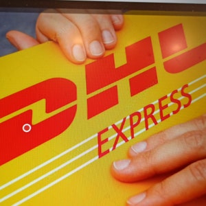 Upgrade shipping via DHL Express for U.S.A and Canada