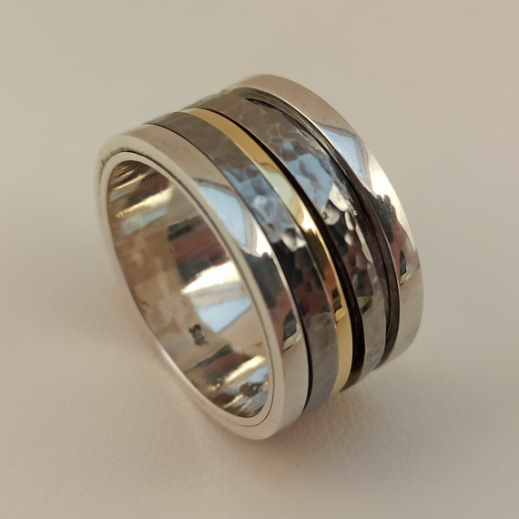 Spinning ring in sterling silver and solid gold 18 K,  Hand made spinning ring made of sterling silver and 18 K gold