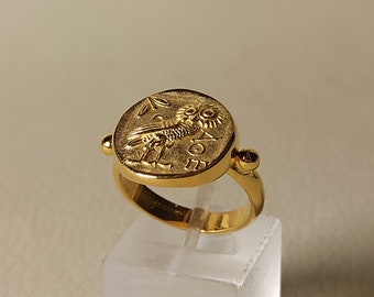 Ring with the figure of an owl , symbol of wisdom ,in 14K solid yellow gold