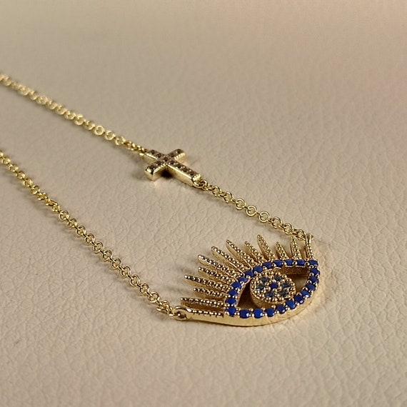 Evil eye necklace with lapis and aquamarine color cubic zirconia in 14 ct. solid yellow gold